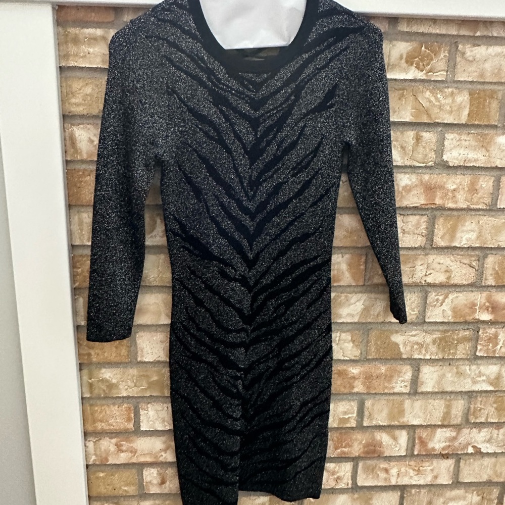 Slinky Express sweater dress perfect for New Years Eve. Size XS.